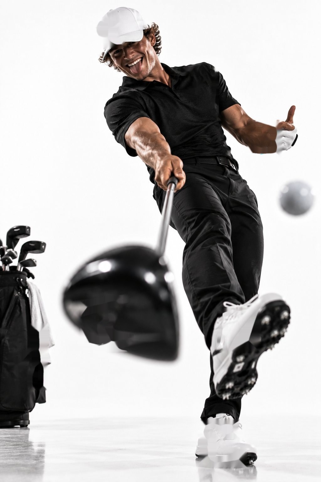 Golfer grinning through his follow-through